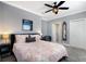Cozy bedroom with soft lighting, carpet, and contemporary decor at 541 Fore Dr, Bradenton, FL 34208