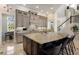 Spacious kitchen features a large granite island, stainless steel appliances, and custom cabinetry at 541 Fore Dr, Bradenton, FL 34208