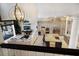 Open-concept living room and kitchen with island, stainless appliances, and ample seating at 541 Fore Dr, Bradenton, FL 34208