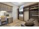 Office with built in desk, cabinetry, shelves and a pull out sofa at 541 Fore Dr, Bradenton, FL 34208