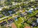 Aerial view of home with fenced backyard, featuring a pool, and an outdoor seating area at 5524 25Th W St, Bradenton, FL 34207