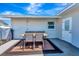 Outdoor dining area with seating and a covered patio, perfect for entertaining and relaxation at 5524 25Th W St, Bradenton, FL 34207