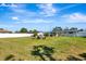 Large backyard with green lawn and patio area, perfect for outdoor gatherings and enjoying the outdoors at 5524 25Th W St, Bradenton, FL 34207