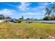 Expansive backyard featuring a fire pit area and ample space for outdoor activities at 5524 25Th W St, Bradenton, FL 34207