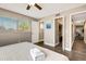 Bright bedroom with a large window and a closet offers comfort and functionality at 5524 25Th W St, Bradenton, FL 34207