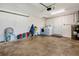 Spacious garage with washer, dryer, and water heater, offering functionality and ample storage space at 5524 25Th W St, Bradenton, FL 34207