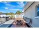 Back yard with pool, outdoor furniture, privacy fence, and hot tub area at 5524 25Th W St, Bradenton, FL 34207