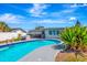 Sparkling pool area surrounded by lush landscaping, perfect for relaxation and enjoying outdoor living at 5524 25Th W St, Bradenton, FL 34207