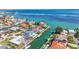 Waterfront property featuring a modern home, pool, boat dock, and canal access at 560 Schooner Ln, Longboat Key, FL 34228