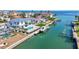 Waterfront property featuring a modern home, pool, boat dock, and canal access at 560 Schooner Ln, Longboat Key, FL 34228