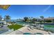 Breathtaking aerial view of a waterfront property with a private dock and lush landscaping at 560 Schooner Ln, Longboat Key, FL 34228