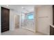 Spa-like bathroom with marble walk-in shower, sleek fixtures, and modern vanity at 560 Schooner Ln, Longboat Key, FL 34228