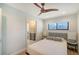 Inviting bedroom with view into the bathroom, showcasing a seamless and stylish transition between spaces at 560 Schooner Ln, Longboat Key, FL 34228