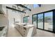 Bright, open kitchen featuring a large island, modern appliances, and seamless access to the outdoor patio at 560 Schooner Ln, Longboat Key, FL 34228