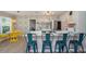 Modern kitchen features stainless steel appliances, stylish seating, and a bright dining area at 617 26Th W St, Bradenton, FL 34205