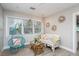 Bright living room with cozy furniture and a hanging chair at 617 26Th W St, Bradenton, FL 34205