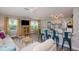 Bright living space with open floor plan, stylish seating, and modern finishes at 617 26Th W St, Bradenton, FL 34205
