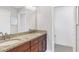 Bathroom featuring a double vanity with granite countertops at 6637 Bowline Dr, Sarasota, FL 34231