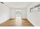 Spacious bedroom with laminate flooring, neutral walls, and natural light at 6637 Bowline Dr, Sarasota, FL 34231