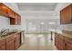 Bright open kitchen with granite countertops and seamless flow to the dining and living areas at 6637 Bowline Dr, Sarasota, FL 34231