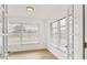 Bright office space with neutral walls, tile flooring, and natural light at 6637 Bowline Dr, Sarasota, FL 34231