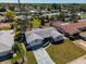 An aerial view of a charming single-story home with an attached one car garage and driveway at 7307 14Th W Ave, Bradenton, FL 34209