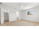 Bright bedroom features neutral paint, wood flooring, and ensuite bathroom access at 7307 14Th W Ave, Bradenton, FL 34209