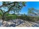 A spacious deck with wood railings offers views of waterfront, blending nature and relaxation at 7615 4Th W Ave # 7615, Bradenton, FL 34209