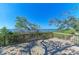 A waterfront deck provides views of the peaceful waters beyond, framed by greenery, offering a serene outdoor space at 7615 4Th W Ave # 7615, Bradenton, FL 34209