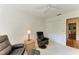Cozy sitting room with comfortable leather chairs, closet, and soft lighting at 7615 4Th W Ave # 7615, Bradenton, FL 34209