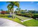Enjoy a game of bocce ball in this beautifully maintained court surrounded by lush landscaping at 7665 Bergamo Ave, Sarasota, FL 34238