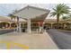 Community gas station with palm trees and covered fueling stations, a convenient amenity for residents at 7665 Bergamo Ave, Sarasota, FL 34238