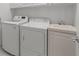 Laundry room with washer, dryer, and sink at 7665 Bergamo Ave, Sarasota, FL 34238