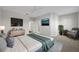 Spacious main bedroom featuring contemporary decor, a ceiling fan, and neutral colors at 7665 Bergamo Ave, Sarasota, FL 34238