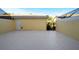 Back patio featuring a private entrance and access to the outdoors at 7665 Bergamo Ave, Sarasota, FL 34238