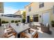 Inviting outdoor patio with ample seating, perfect for entertaining guests or relaxing in style at 7665 Bergamo Ave, Sarasota, FL 34238