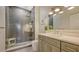 Stylish bathroom featuring a glass shower, modern vanity, and updated fixtures at 7782 Club Ln, Sarasota, FL 34238