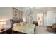Bedroom with spiral staircase and decorative artwork at 7782 Club Ln, Sarasota, FL 34238