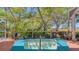 A relaxing hot tub enclosed in a screened lanai provides a serene and private outdoor experience at 7782 Club Ln, Sarasota, FL 34238