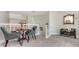 Cozy loft featuring a sitting area with stylish furnishings and elegant lighting at 7782 Club Ln, Sarasota, FL 34238