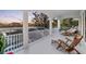 Beautiful balcony overlooking a pool and surrounding scenery, perfect for relaxing or entertaining at 8258 Midnight Pass Rd, Sarasota, FL 34242