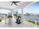 Spacious balcony with outdoor grill and scenic water views at 8258 Midnight Pass Rd, Sarasota, FL 34242