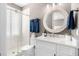 Elegant bathroom featuring a glass shower and stylish vanity with undermount sink and tasteful fixtures at 8258 Midnight Pass Rd, Sarasota, FL 34242