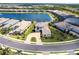 Breathtaking aerial view of the beautiful community and the stunning waterfront home at 8265 Pavia Way, Bradenton, FL 34202