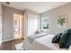 Bedroom featuring light-colored walls and access to an ensuite bathroom at 8265 Pavia Way, Bradenton, FL 34202