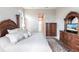 Comfortable main bedroom with a decorative bed frame and ample closet space at 8265 Pavia Way, Bradenton, FL 34202