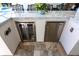 A convenient stainless wine cooler and mini-fridge are under the marble countertop bar at 8265 Pavia Way, Bradenton, FL 34202