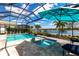 This fabulous pool and patio area offers stunning lake views at 8265 Pavia Way, Bradenton, FL 34202