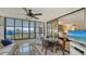 The lanai has comfortable seating and is open to the bedroom with great water views at 8735 Midnight Pass Rd # 301B, Sarasota, FL 34242