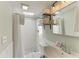 Bathroom featuring white subway tile, decorative floor tile, and shower with curtain at 12204 45Th Avenue W Dr, Cortez, FL 34215